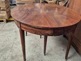 a table that is sitting on the floor in a room