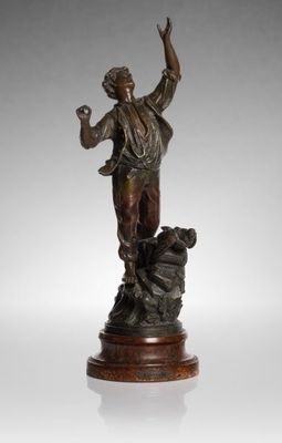 a bronze statue of a woman holding a bird on a pedestal