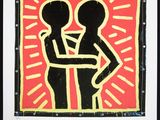 framed art print of a couple holding each other in front of a red and yellow background