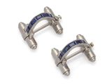 a pair of silver cufflinks with blue enamel inlays