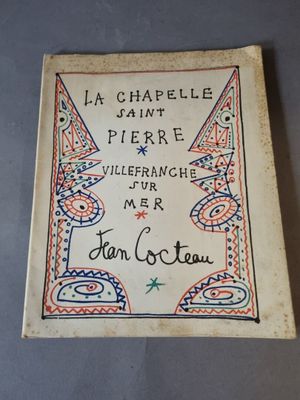a close up of a book with writing on it on a table