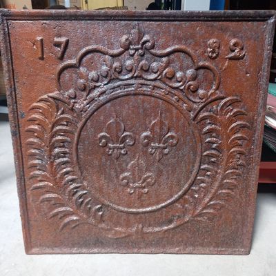 a close up of a wooden box with a design on it