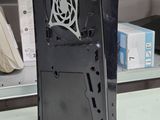 a black computer sitting on top of a desk