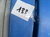 a blue trash can with a sticker on it