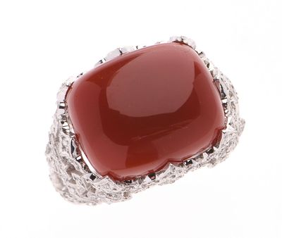 BAGUE en or gris 750 °/°° et platine 800 °/°° centrée d'un i…