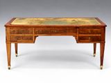 an antique writing desk with two drawers and a marble top