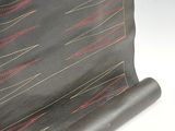 leather purse with red and yellow lines on the inside
