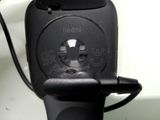a cell phone that is connected to a charger