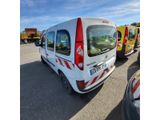 a white van that is parked in a parking lot