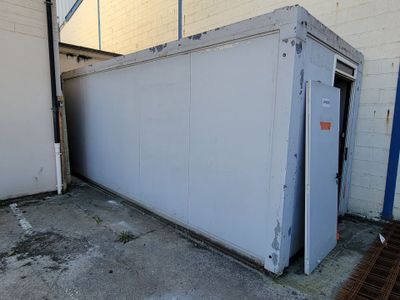 an image of a storage container outside of a building