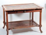 a wooden table with a glass top on a white background