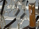 a chandelier that has a lot of glass beads hanging from it