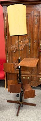 a chair and a desk in a room with a red chair