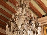a chandelier hanging from the ceiling in a room