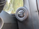 a close up of a car ' s steering control knob