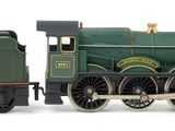 a toy train that is sitting on a white surface