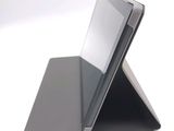 a tablet that is sitting on top of a stand