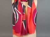 a close up of a scarf on a mannequin head