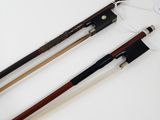 three different types of violin bows on a white surface