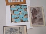 pictures of people on the wall of a room