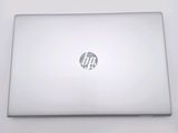 a laptop that is sitting on a white table