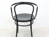 the chair is black and has a black seat on it