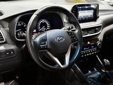 the interior of a car with a steering wheel, dashboard, and dash board