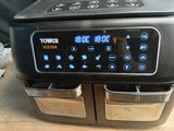 a toaster that has a digital clock on it