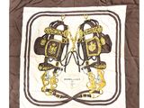brown and white scarf with gold chains and purses on it