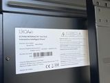 a close up of a laptop with a label on it