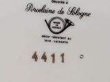 a close up of a plate with a number on it