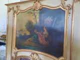 a picture of a painting on the wall of a room