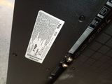 a close up of a computer monitor with a sticker on it