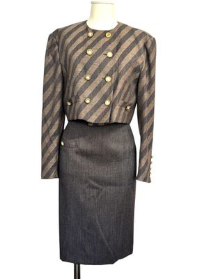a dress and jacket on a mannequin mannequin mannequin mannequin mannequin mannequin mannequin mannequin manne