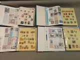 a lot of stamps on the pages of a book