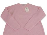 a pink sweater on a white background