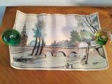 a picture of a place mat with a picture of a bridge on it
