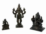 three bronze figurines of hindu deities on a white background
