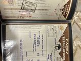 a box that has a passport and a ticket inside of it