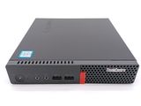 the back of a small black computer on a white surface