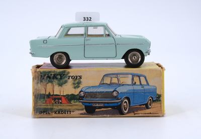 a blue toy car sitting on top of a box
