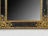a mirror that is on the wall in the room