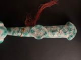 a blue and white object on a black surface