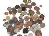 an image of a pile of old coins on a white surface