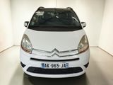 a picture of a white citrole parked in a white room