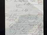 a piece of paper with writing on it sitting on a table