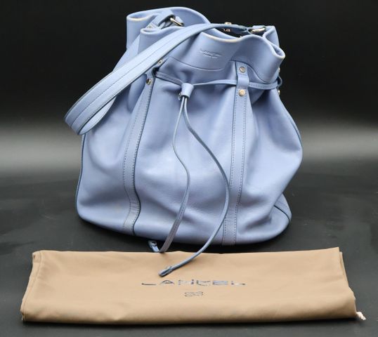 LANCEL   Sac seau en cuir gainé avec dustbag. Quelques usures