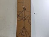 une image représentant une boîte en carton sur laquelle figure l'image d'un vélo