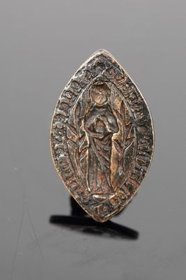 an image of a gold and silver coin with a woman holding a child