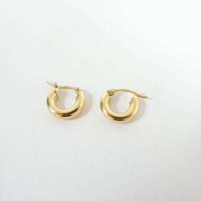 a pair of gold hoop earrings on a white background